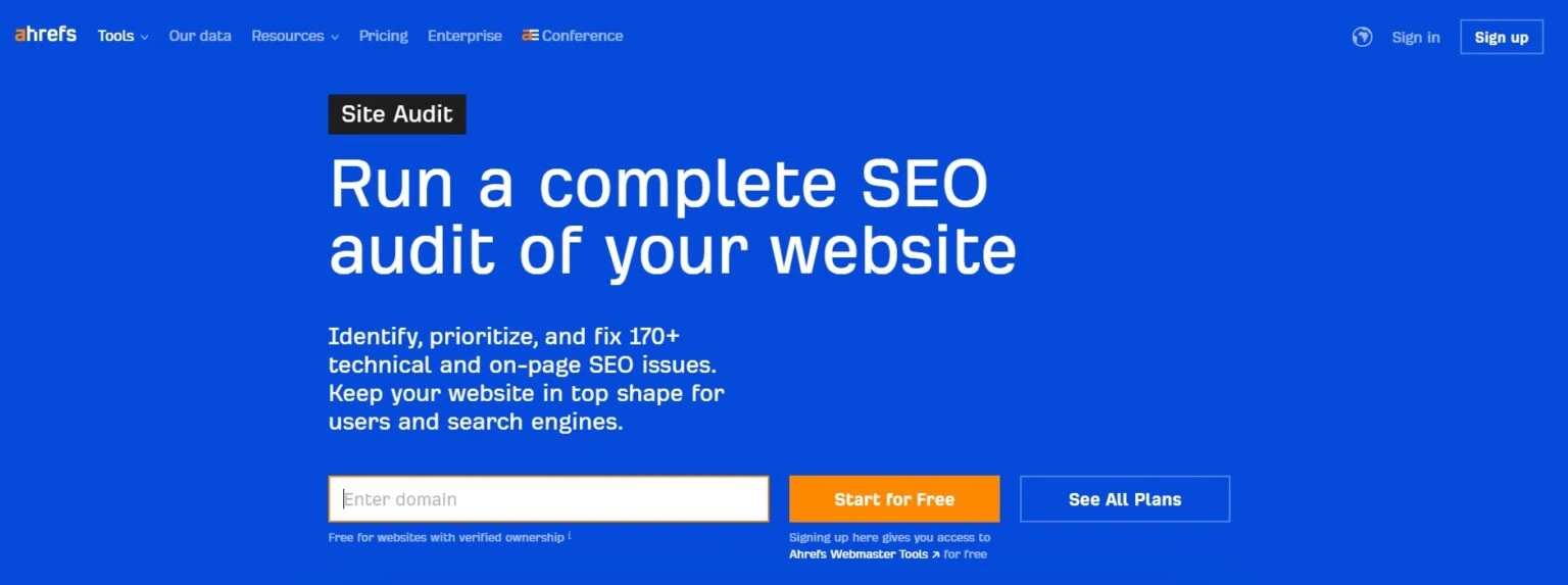 Ahrefs homepage promoting a site audit tool to run a complete SEO audit of a website. The page features text about identifying and fixing 170+ SEO issues, with an input field to 'Enter domain' and a 'Start for Free' button.