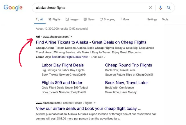 Google search results for 'alaska cheap flights' showing a prominent ad, illustrating what is SEM in digital marketing.