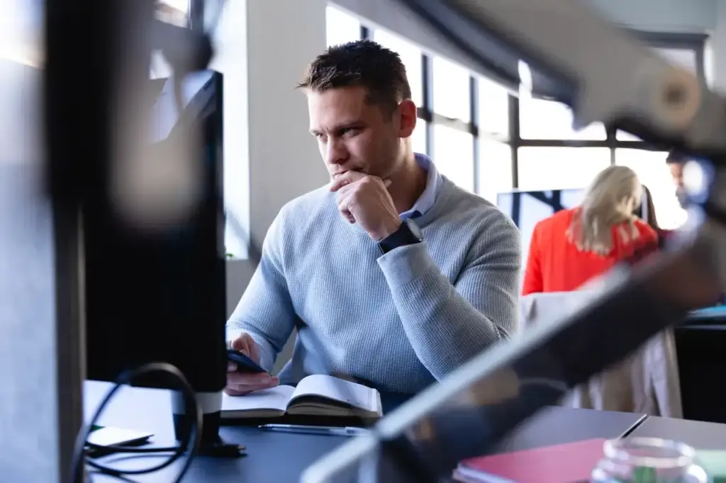 digital marketing agency expert deep in thought over marketing analytics.
