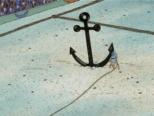 Tiny Spongebob Squarepants struggles to pull a massive black anchor across a sandy arena, illustrating the power of the primacy effect.